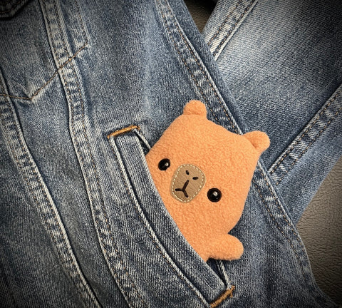 Mini Baby Capybara Plush - in Jean Jacket Pocket.